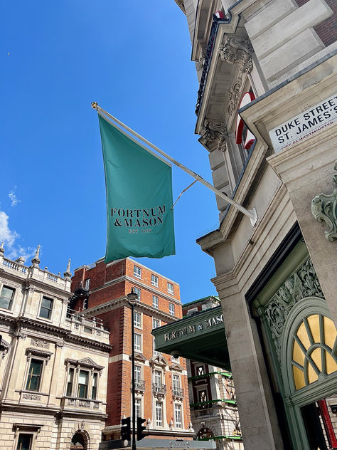 The Blue Fortnum & Mason Flag Outside Of The World-Famous Department Store In London. London Department Stores, Fortnum And Mason London, Alphabet Mugs, London Vacation, Fortnum Mason, Food Hampers, London Shopping, London History, Branding Inspo