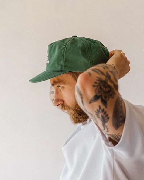 The Slow Sundays Cap in green is a 5-panel cap made from a durable 100% cotton twill. It features an adjustable strap and direct embroidery on the front panel. Take some time to appreciate the small things.