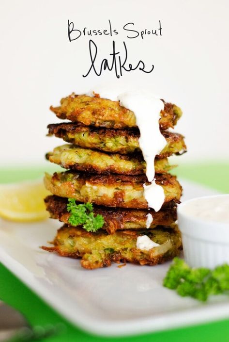 These all-star Brussels sprout latkes combine classic potatoes with healthy Brussels sprouts and are topped with a creamy Dijon yogurt sauce. Thanksgiving Recipes Appetizers, Hannukah Recipes, Dinners Under 500 Calories, Creamy Dijon, Baked Falafel, Thanksgiving Appetizer Recipes, Brussels Sprout, Sprout Recipes, Recipes Appetizers