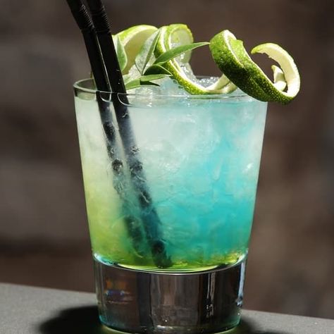 Turquoise blue cocktail is delicious, refreshing rum-based mixed drink.Very easy to make! | Magic Skillet | Recipes With Fruit Cocktail, Recipes Fruit, Rum Cocktail Recipes, Fruit Cocktail, Colorful Cocktails, Blue Cocktails, Lemon Lime Soda, Cocktail Mix, Mixed Drinks Recipes