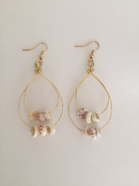 Hawaiian Sea Shells Gold plated wire double hoop earrings. The gold plated wire and earring hooks are tarnish resistant and nickel and lead free. These precious Hawaiian shells were hand picked from the beaches of Hawaii. This is a great keepsake gift for someone special! Actual shells may vary. Each pair of earrings is unique! Coastal Creations, Hawaii Sea, Sea Earrings, Ocean Inspired Jewelry, Sea Jewelry, Double Hoop Earrings, Seashell Earrings, Seashell Jewelry, Earrings Inspiration