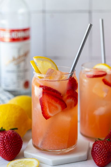 This Strawberry Lemonade Vodka is simple to make and the PERFECT refreshing cocktail for summer get togethers or just because! Tito’s Strawberry Lemonade, Strawberry Vodka Drinks, Strawberry Vodka Lemonade, Shot Of Vodka, Amazing Drinks, Strawberry Cocktails, Italian Drinks, Strawberry Vodka, Summer Drinks Alcohol