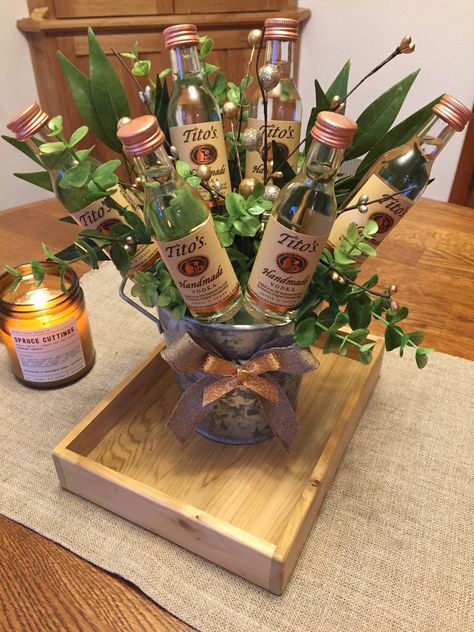 Tito’s Vodka Gift Basket Tito’s Gift Basket, Tito’s Birthday Gift, Tito’s Gift Ideas, Gifting Alcohol Ideas, Tequila Gift Basket Ideas Diy, Vodka Basket Gift Ideas, Alcohol Gift Basket Ideas For Women, Liquor Centerpieces, Vodka Bouquet