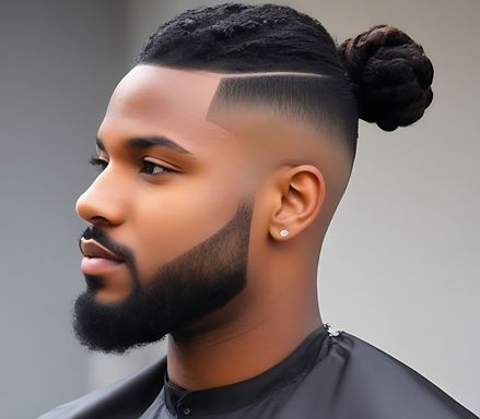 Embrace the trend of a man bun while keeping the sides clean with a mid taper fade for a balanced and stylish appearance. Black Male Haircuts, Taper Fade Black, Mid Taper Fade, Mid Taper, High Top Dreads, Man Bun Beard, Male Haircuts, Colored Dreads, Afro Hairstyles Men