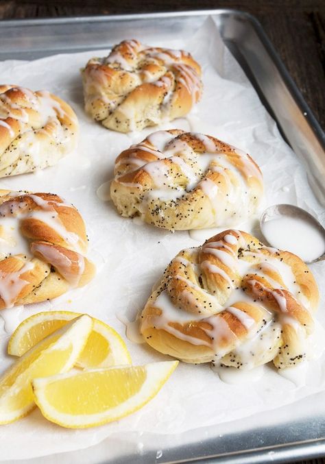 Glazed Lemon Poppy Seed Knots Lemon Poppy Seed, Bakery Ideas, Lemon Poppy, Breakfast Pastries, Lemon Poppyseed, Poppy Seed, Lemon Recipes, Sweet Savory, I Love Food