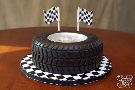 Vanilla cake with vanilla frosting, covered in fondant. We lost count of how many treads were individually placed! Bmw Torte, Tire Cake, Motorcycle Cake, Wheel Cake, Shaped Cake Pans, Truck Cakes, Fathers Day Cake, Car Cake, Cakes For Men