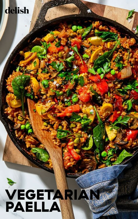 This Vegetarian Paella Is Loaded With All Your Favorite FlavorsDelish Veggie Paella Recipe, Vegetarian Paella Spanish, Spanish Healthy Recipes, Vegetarian Cast Iron Recipes, Paella Recipe Vegetarian, Vegetarian Paella Recipe, Paella Vegetarian, Vegetable Main Dishes, Veggie Paella