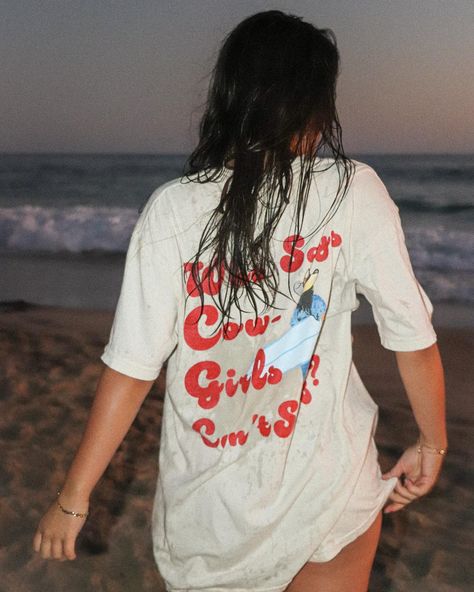 Who says cowgirls can’t surf? Not us. Go check out this new release and more in our bio🤠🌊 Surfing Cowgirl, Beach Cover Ups, Cow Girl, Beach Shirt, Who Said, Beach Covers, New Release, Beach Shirts, Beach Babe