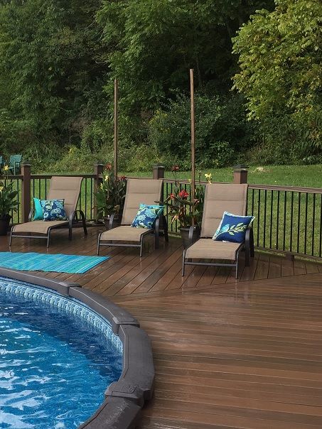 Above-ground pool deck surround. Composite or PVC decking is a good choice over wood. Here's why. Pool Deck Decorations, Landscaping Pool, Pool Deck Plans, Deck Pool, Swimming Pool Decks, Pool Hacks, Above Ground Pools, Pool Life, Above Ground Pool Landscaping