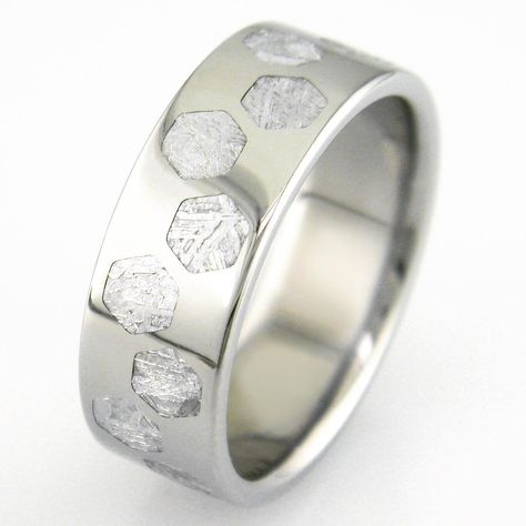 Here's our first Meteorite Hex ring. It took some special equipment and programming to be able to do it. Let me know what you think! We… Hex Ring, Gibeon Meteorite, Titanium Ring, Titanium Rings, Visual Kei, Outer Space, Cyberpunk, Band Rings, The Ring