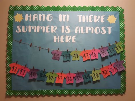 Countdown till summer bulletin board with removable numbered t-shirts Bulletin Board Ideas For End Of School Year, Spring Into Summer Bulletin Board, Inching Into Summer Bulletin Board, Last Day Of School Countdown Board, Summer Vacation Bulletin Board Ideas, May School Bulletin Board Ideas, Summer School Board Ideas, Last Month Of School Bulletin Board, June Bulletin Board Ideas For Work