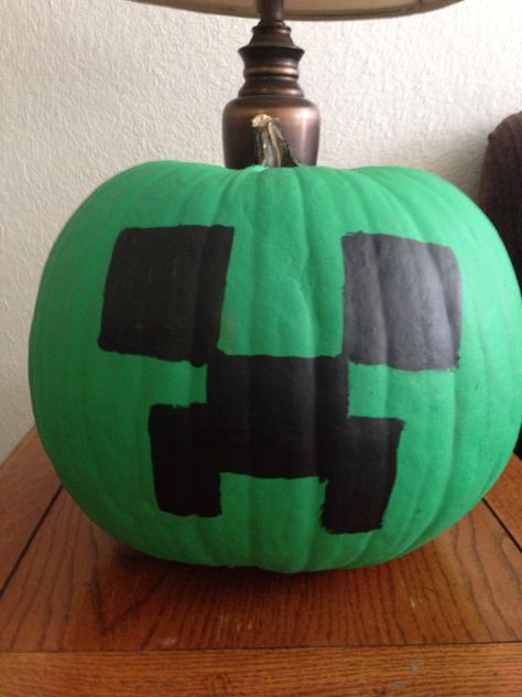 Creeper pumpkin Creeper Pumpkin Painting, Pumpkin Painting Ideas Minecraft, Minecraft Painted Pumpkins, Minecraft Pumpkin Painting, Creeper Pumpkin, Minecraft Pumpkin, Painting Minecraft, Book Character Pumpkins, Pumpkin Painted