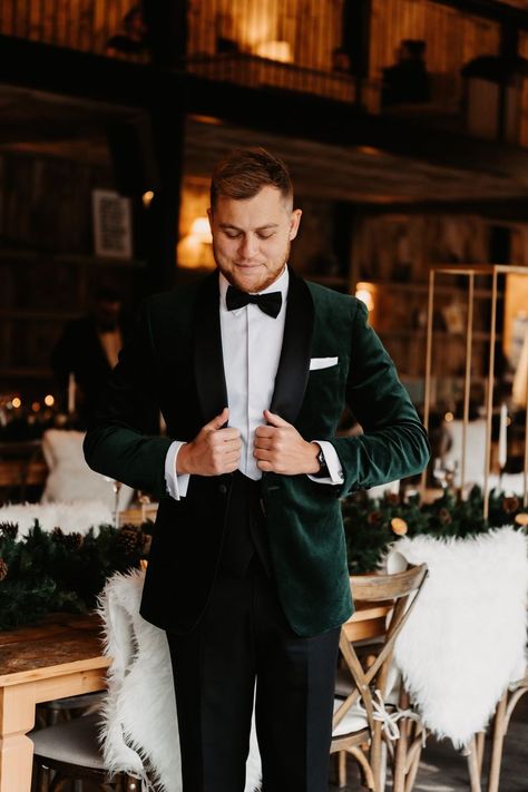 Groom in black tie outfit with velvet green suit jacket for winter wedding in barn venue based in the Lake District Wedding Suits Groom Emerald Green, Groom Outfit Winter Wedding, Velvet Suit Jacket Wedding, Green Suit Jacket Wedding, Men’s Wedding Suits 2023, Emerald Green Tie Black Suit, Forest Green Velvet Suit Men, Green Jacket Groom, Emerald Green Velvet Tuxedo