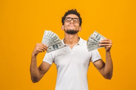 Young rich african american man in casua... | Premium Photo #Freepik #photo #money #man #hipster #shirt Holding Money Pose, Thumbnail Poses, Man With Money, Men With Money, Photo Money, Formal Poses, Thinking Pose, Man Thinking, Rich Person