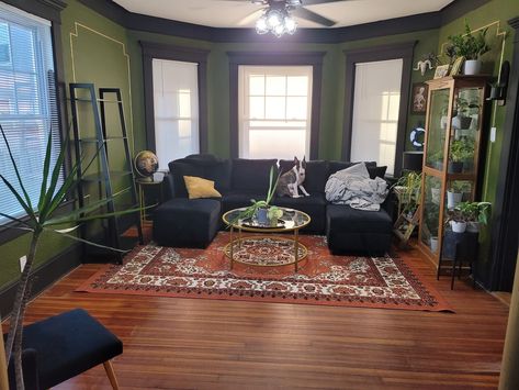 Wood Black Green Interior, Dark Green Living Room Aesthetic, Black And Green Apartment Aesthetic, Green Black Living Room, Green And Black Living Room, Black Interior House, Black Home Aesthetic, Sunroom With Fireplace, Dark Alchemy