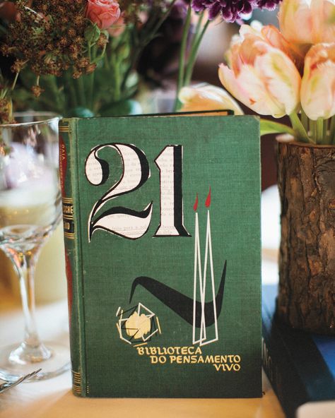 To make the table numbers for his wedding, groom Eric cut digits from the pages of vintage books and pasted them to the covers. Book Table Numbers, Wedding Table Number Ideas, Unique Table Numbers Wedding, Books Table, Vintage Table Numbers, Table Number Ideas, Unique Table Numbers, Moh Duties, Table Numbers Wedding Diy