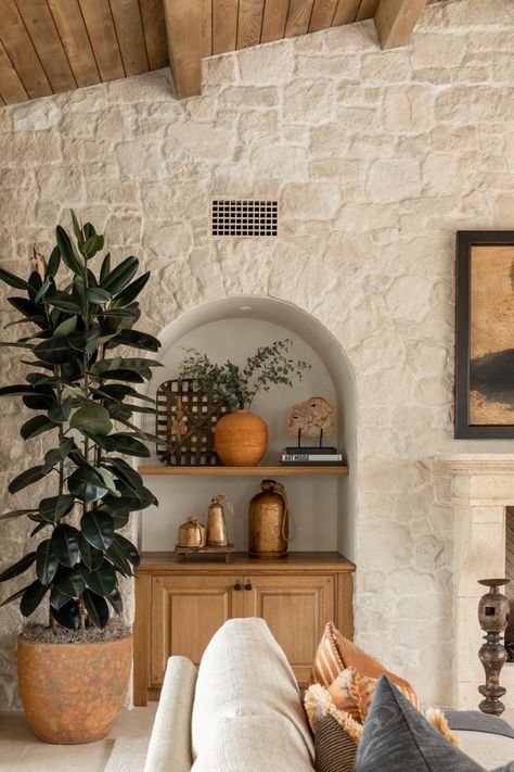 stone-fireplace-with-built-in-cabinet Italian Style Home, Mediterranean Living Room, Stone Walls Interior, Mediterranean Interior Design, Stone Accent Walls, Mediterranean Interior, Mediterranean Living, Mediterranean Style Home, Built In Cabinet