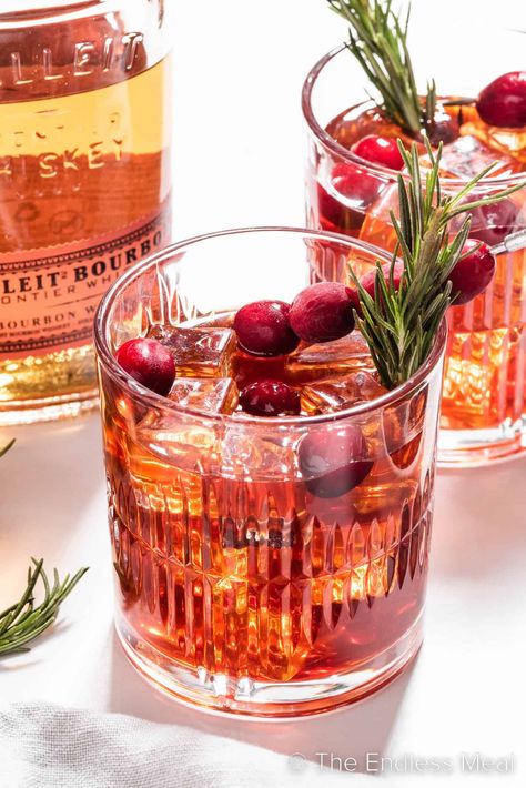 This cranberry bourbon sour is a fruity and festive spin on a classic cocktail. It's made with 100% cranberry juice which gives it a naturally sweet-tart taste and a ruby red hue. It's perfect for the holidays, and it's ready in just 5 minutes! #theendlessmeal #bourbonsour #cranberry #cranberrybourbonsour #bourbon #cocktail #drink #holidaydrink #christmasdrink #christmascocktail #holidaycocktail Bourbon Sour Recipe, Drinks With Cranberry Juice, Unsweetened Cranberry Juice, Bourbon Sour, Bourbon Cocktail, Citrus Cocktails, Sour Foods, Cranberry Cocktail, Bourbon Drinks