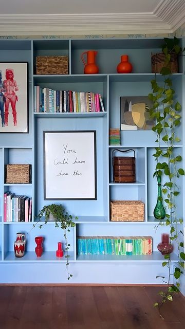 Pop Colour Interior, Lisa Dawson Interiors, Diy Painted Shelves, Painted Bookshelf Wall, Wall Of Shelves Office, Funky Built In Shelves, Blue Shelves Living Room, Colourful Shelves, Colourful Bookshelf