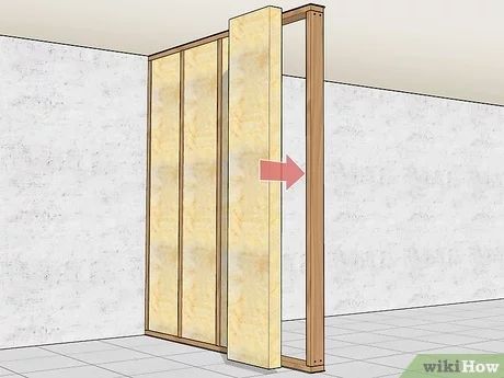 How to Build a Fake Wall: 12 Steps (with Pictures) - wikiHow Diy Dividing Wall, Building A False Wall, Making A Temporary Wall Room Dividers, Building A Room Divider Wall, Building A Wall With A Door, How To Build Interior Wall, How To Make A Divider Wall, Easy Diy Partition Wall, Build Interior Wall