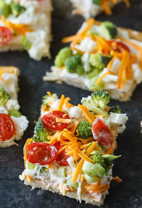 Vegetable Pizza - This easy appetizer is perfect for parties and potlucks. It's made with crescent roll dough, ranch dressing mix and loads of fresh, crispy veggies. Yum! Veggie Ranch Pizza, Vegetable Pizza Appetizer Crescent Rolls, Veggie Pizza Crescent Pillsbury, Cold Vegetable Pizza With Cream Cheese, Pampered Chef Vegetable Pizza, Veggie Pizza With Crescent Rolls, Veggie Pita Pizza, Homemade Veggie Pizza Recipe, Recipe For Veggie Pizza