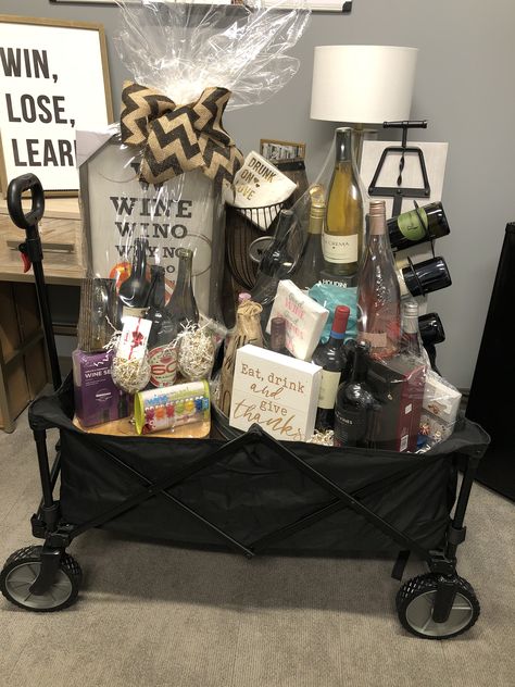 Wagon Gift Basket Ideas, Diy Auction Basket Ideas, Big Raffle Basket Ideas, Home Decor Basket Ideas, Classroom Auction Basket Ideas, Extravagant Gift Baskets, Auction Theme Baskets, Wine Auction Basket Ideas, Large Raffle Basket Ideas