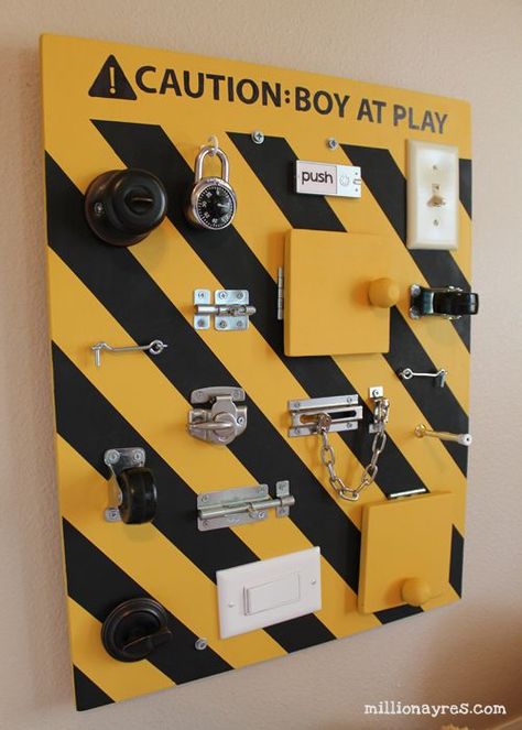 DIY busy board full of switches, latches, and doo-dads for babies and toddlers to manipulate. Diy Busy Board, Busy Boards For Toddlers, Sensory Boards, Board For Kids, Sensory Room, Activity Board, Busy Board, Diy Toys, Toddler Activities