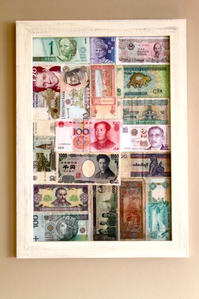 The foreign money jar gets some inspiration | Cultural Jet Lag Foreign Money, Souvenir Display, Travel Photos Display, Travel Room, Money Jar, Travel Crafts, Money Jars, Coin Display, Travel Keepsakes