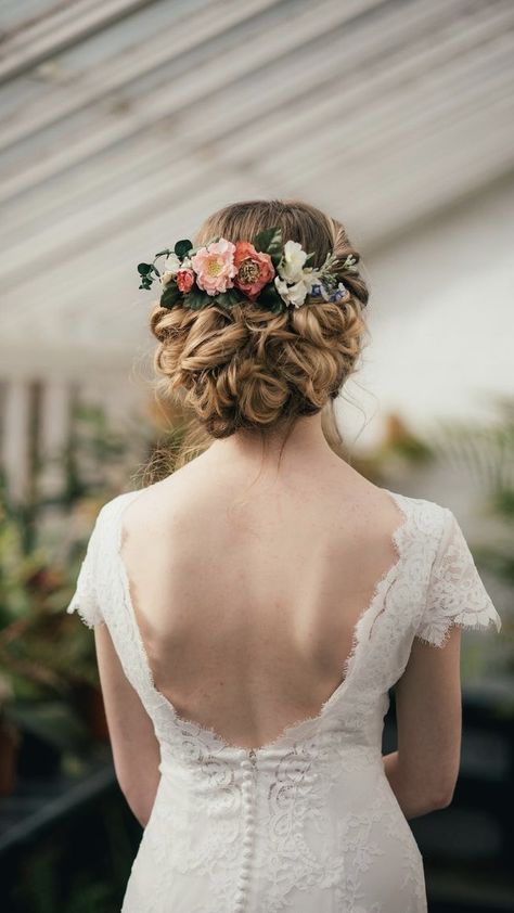 Wedding Updo With Flowers And Veil, Boho Bridal Updo With Flowers, Wedding Hair Updo Flowers, Floral Bride Hair, Floral Updo Wedding, Flower Comb Hairstyle, Bridal Hair With Flower Comb, Wild Flower Hair Wedding, Bride Flower Hairstyles