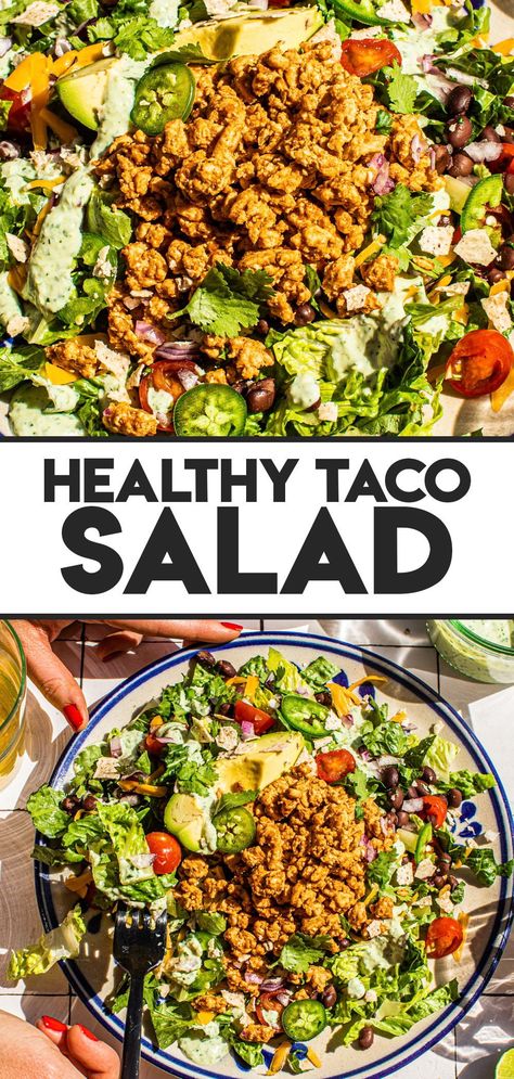 This Healthy Taco Salad is a layer-upon-layer of crisp, crunchy vegetables, beans, cheese and seasoned ground turkey all tossed with a homemade creamy avocado dressing. Enjoy it as a light lunch or dinner, or store it for meal prep throughout the week! Salad With Ground Turkey, Easy Healthy Taco Salad, Ground Turkey Taco Salad, Seasoned Ground Turkey, Taco Salad Recipe Healthy, Healthy Taco Salad, Ground Chicken Tacos, Taco Salad Dressing, Hearty Salad Recipes