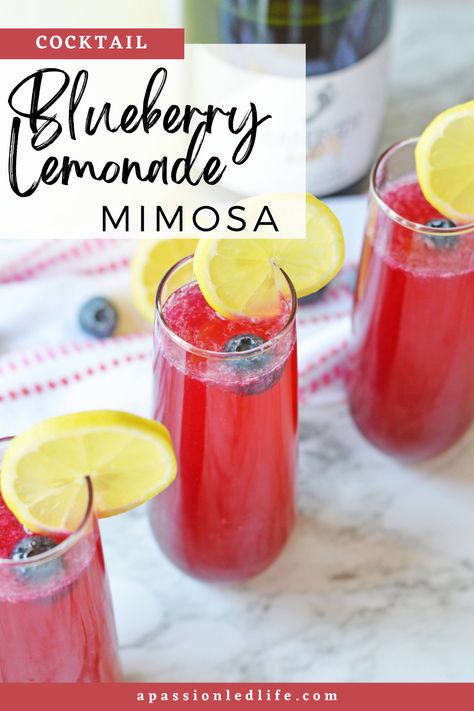 Blueberry Lemonade Mimosa is made with frozen blueberries, lemonade, and sparkling wine. It's the perfect cocktail for spring and summer brunches Blackberry Mimosa Recipe, Blueberry Lavender Mimosa, Mimosa By The Pitcher, The Best Mimosa Recipe, Lemon Blueberry Mimosa, Blueberry Wine Cocktail, Fun Mimosa Recipe, Lemosa Recipe, Blueberry Mimosa Recipe