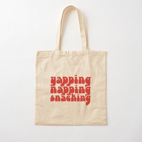 Get my art printed on awesome products. Support me at Redbubble #RBandME: https://www.redbubble.com/i/tote-bag/Yapping-Napping-Snacking-Retro-Typography-by-DazzlineDesigns/162401100.P1QBH?asc=u Tote Bag Typography, Retro Typography, Print Tote, Printed Tote Bags, Tote Bag Design, Bag Sale, Printed Cotton, Tote Bags, My Art