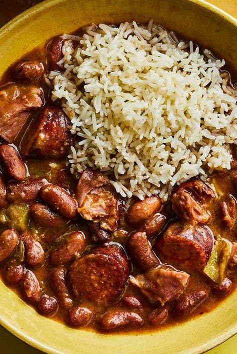 This red Beans and rice recipe from Kwame Onwuachi's book, My America, is his ideal version of the classic Southern dish. It's based on his mom's rendition and starts with the Cajun and Creole trinity of celery, onion, and bell pepper. Red Beans And Cornbread, Red Beans And Rice Meal Ideas, Southern Style Red Beans And Rice, Authentic Louisiana Red Beans And Rice Recipe, Mild Red Beans And Rice Recipe, Red Beans And Rice With Ground Beef, Sides For Red Beans And Rice, Red Beans And Rice Recipe Stovetop, Red Beans And Rice Recipe Cajun