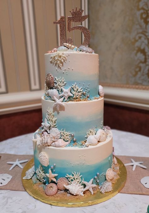 Ocean Wedding Cake Ideas, Wedding Cake Sea Theme, Sea Theme Quinceanera Ideas, Sea Themed Quinceanera, Costal Theme Birthday Party, Under The Sea Sweet 16 Cake, Quinceanera Beach Theme, Coastal Wedding Cake Ideas, Under The Sea Xv Theme