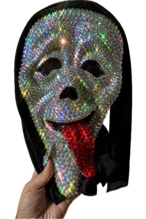 ♥ Often imitated never duplicated Ghost face mask covered in Swarovski element crystals. We DO NOT use cheap dull craft store crystals. ♥ ALL Masks will now come with fully blinged mouths +Nose in black crystals  ♥These Masks are the original Ghostface Masks with the hood attached, this is NOT the style without the hood that you have to hold on your face. ♥ Available in iridescent, clear crystal, light pink, hot pink, bloody. ALL ITEMS ARE FINAL SALE We do not accept cancellations after (1) hour Ghost Face Rhinestone Mask, Ghost Face Wassup, Ghostface Masks, Mascara Halloween, Ghostface Mask, Store Crystals, Photoshoot Diy, Vendetta Mask, Ghost Face Mask