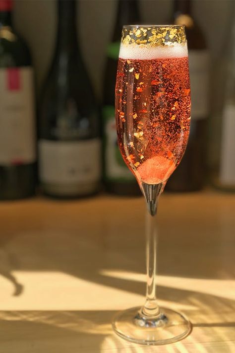 13 Winter Drinks That Will Knock the Cold Right Out of You #purewow #holiday #restaurants #cocktail #food #drink Rose Gold Drinks, Princess Cocktails, Silver Food, New Year's Drinks, Rose Drink, Rose Gold Cocktail, New Years Cocktails, Cocktail Food, Spiked Hot Chocolate