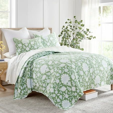 The Evelyn Jacobean Floral Reversible King Quilt Set by Levtex Home is inspired by botanical nature garden. Offered in green, blue and white, this design will immediately transform your bedroom. This reversible quilt features a romantic aray of botanical flowers in white and blue on a green ground on the front, reversing to a blue dot stripe on a white ground on the back. The King Quilt (106x96in.) and two Shams (20x36in.) have a rayon front and cotton back, filled with a cotton-rich filler and Timeless Bedding, Coordinates Decor, Jacobean Floral, King Quilt Sets, Top Of Bed, Quilt Care, Perfect Bedding, Floral Quilt, Coverlet Set