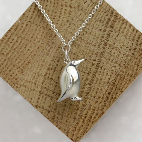 Our silver Penguin Necklace http://www.janareinhardt.com/collections/polar-nights-jewellery/products/penguin-pendant-necklace Penguin Pendant, Penguin Necklace, Polar Night, Brand Clothes, Pretty And Cute, Jewellery Collection, Cute Jewelry, Winter Collection, Arrow Necklace