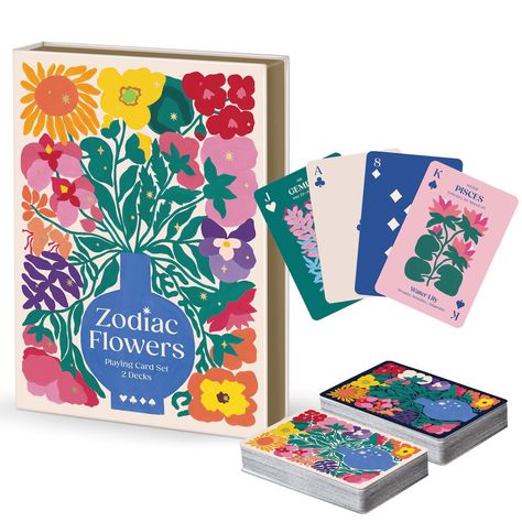 PRICES MAY VARY. ♠️ PLAYING CARDS – The Zodiac Flowers Playing Card Set by Galison features beautiful floral art paired with zodiac signs throughout the set of 2 card decks. The set includes 2 decks of 52 high quality playing cards, each featuring a unique and vibrant flowery design. These cards are the perfect way to add a touch of beauty and cosmic elegance to your next game. ♠️ EASY TO PLAY – The cards have a smooth and easy to shuffle finish, making them perfect for everyday use and they are Playing Card Place Cards, Art Deco Playing Cards, Playing Card Box Design, Zodiac Branding, Deck Of Cards Design, Zodiac Flowers, Card Game Design, Unique Playing Cards, Magnetic Book