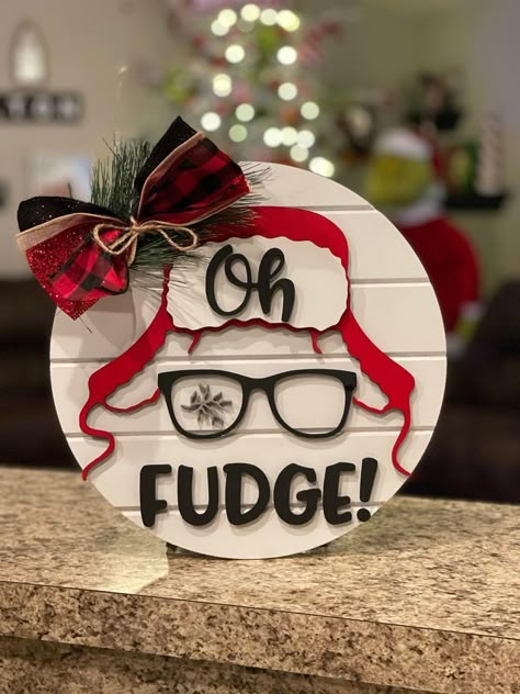 #christmaslights #christmasdecor Oh Fudge Christmas Story Door Hanger, Plaid Christmas Door Hanger, Office Door Hangers, Christmas Story Wreath, Round Wooden Christmas Signs Diy, Christmas Door Hangers Wooden, Fall Door Hangers Wooden, Holiday Crafts To Sell, Seasonal Door Hangers