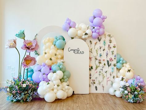 Natural beauty and vibrant colors of enchanted wildflower decor 🌸 We enjoy working at @riverplacecountryclub ✨ | Instagram Wildflower Balloon Backdrop, Balloon Garlands With Flowers, Flowers And Balloons Decoration, Wildflower Birthday Party Decor, Bday Balloons, Wildflower Birthday Party, Wildflower Decor, Gender Reveal Baby Shower Themes, Graduation Party Backdrops