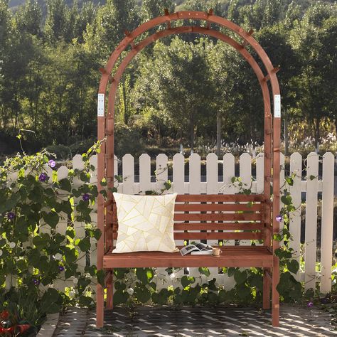 PRICES MAY VARY. Enhance your outdoor space with our 6.8FT Wooden Arch with Bench, an ideal addition to any garden, lawn, or patio. This beautifully crafted arbor not only serves as a stunning garden centerpiece but also provides a cozy spot for two to sit and enjoy nature's beauty. The integrated bench with a high backrest offers comfort for relaxation, reading, or conversation, while the overhead trellis invites climbing plants to create a lush, green canopy. Quality Wood Construction: Crafted from high-grade fir wood that's fully sanded for a smooth finish, this arbor is not only sturdy and durable but also resistant to weather variations Plant Climbing Support: The integrated trellis framework invites climbing plants to weave a natural tapestry of blooms and greenery, creating a living Overhead Trellis, Arch Arbor, Green Canopy, Arbor Bench, Wooden Arbor, Garden Centerpiece, Arbors Trellis, Arch Trellis, Bench Outdoor