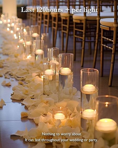 Compared to a traditional burning candle, fake floating candles are lighter and can stay upright in the pool without sinking. led floating candles do not melt and maintain the three-dimensional fullness of the candle without creating residual wax. The wick will not be extinguished by airflow, moisture and collision, and can maintain enough brightness in your wedding or various parties to create a romantic atmosphere Led Candles For Wedding, Battery Powered Candles Wedding, Candle Light Wedding Aisle, Simple Floating Candle Wedding Centerpieces, Vases Floating Candles, Flameless Floating Candles Wedding, Flameless Floating Candle Centerpieces, Evening Candle Lit Wedding, No Flame Candles Wedding