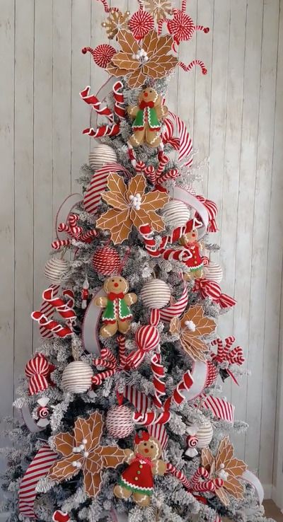 25 Adorable Gingerbread Christmas Decor Ideas - Craftionary Gingerbread Christmas Trees Ideas, Gingerbread Trees Decorated, Ginger Bread Themed Christmas Tree, Gingerbread And Peppermint Christmas Tree, Gingerbread Men Christmas Tree, Christmas Gingerbread Kitchen Decor, Ginger Bread Christmas Tree Ideas, Diy Gingerbread Christmas Tree, Gingerbread Theme Tree