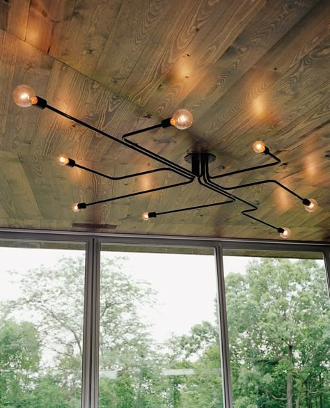 Sleek aluminum-clad house surrounded by forest Blitz Design, Diy Lampe, Lights Hanging, Pipe Lighting, Industrial Living, Industrial Livingroom, Vintage Pendant Lighting, Suspension Vintage, Industrial Interiors