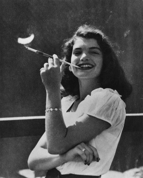 Jackie as a teenager while smoking a cigarette while at her mother's summer home. Lee Radziwill, Jackie Onassis, Jfk Jr, Lucille Ball, Retro Mode, Jackie O, We Are The World, Time Magazine, Famous Faces