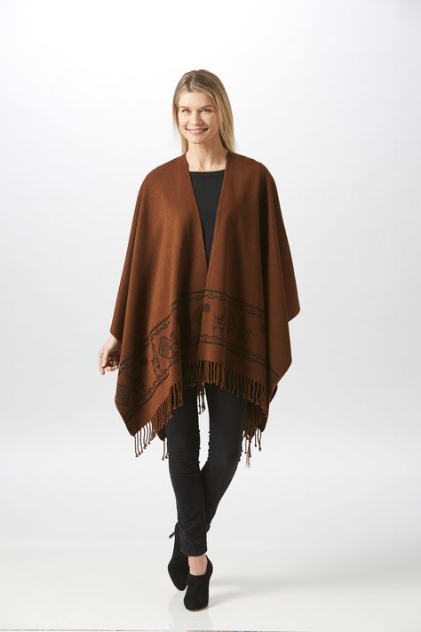 This is the ultimate cozy shawl that keeps you warm on chilly summer nights or a winter evening by the fireplace. It's generous size and ultra-soft material make it a must have accessory. Crafted in Ecuador by skilled artisans, it will be one of the most versatile pieces in your closet. The shawl is offered in a wide range of colors, from bright on-trend colors, to classic neutrals. * 100% Ultra-soft modacrylic material with recycled content * One size fits all * Beautiful tassel detail Shawls c Southwestern Clothing, Southwestern Blankets, Brown Shawl, Handwoven Shawls, Cozy Shawl, Winter Evening, Green Wrap, Native American Design, Native Style