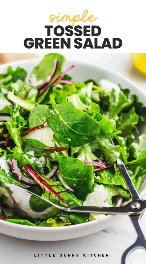 This is the best simple tossed green salad that goes so well with any meal! Fresh dressed greens with a simple lemon or apple cider vinaigrette, it will take you just a few minutes to make! Tossed Green Salad Recipes, Easy Green Salad Recipes, Tossed Green Salad, Green Salad Dressing, Sunny Kitchen, Leafy Salad, Leafy Green Salads, Easy Salad Dressing, Green Salad Recipes