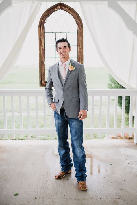 Groom wearing suit jacket and jeans with cowboy boots. Groom in gray suit jacket with boots.  Photo by: Rebecca Chesney Photo & Film Grey Jacket And Jeans Groom, Tux With Jeans And Boots, Gray Suit Jacket With Jeans Wedding, Suit Jackets And Jeans Wedding, Jeans And Sports Coat Wedding, Groom Outfit With Jeans, Country Groomsmen Attire Jeans, Suit And Jeans For Men Wedding, Grey Suit Jacket With Jeans Wedding