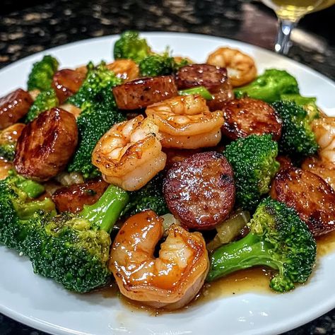 Honey Garlic Shrimp Sausage and Broccoli Honey Garlic Shrimp And Broccoli Recipe, One Pot Garlicky Shrimp And Broccoli, Shrimp Broccoli Foil Packets, Simple Family Dinners Healthy, Honey Shrimp Sausage And Broccoli, Beef Shrimp And Broccoli Stir Fry, Shrimp And Kabasa Recipes, Shrimp And Sausage Sheet Pan Dinner, Different Meals Dinners